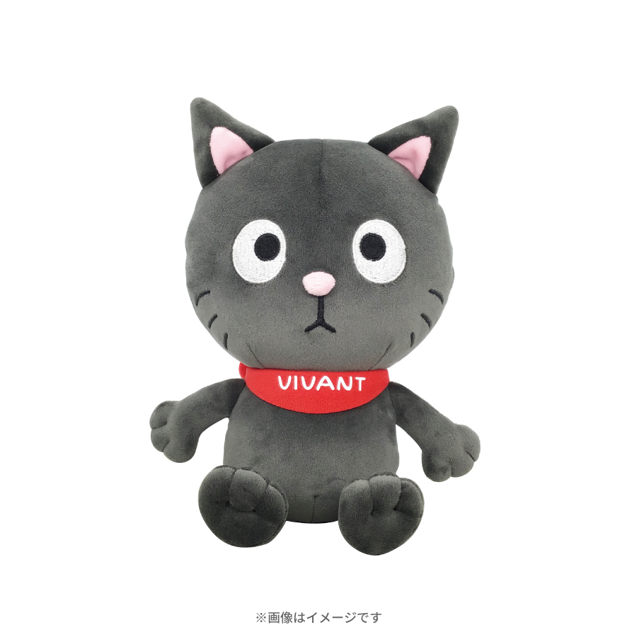 ヴィヴァンちゃんのとがった耳の灰色のぬいぐるみが座り、首に白い文字でVIVANTと入った赤い布を巻いている